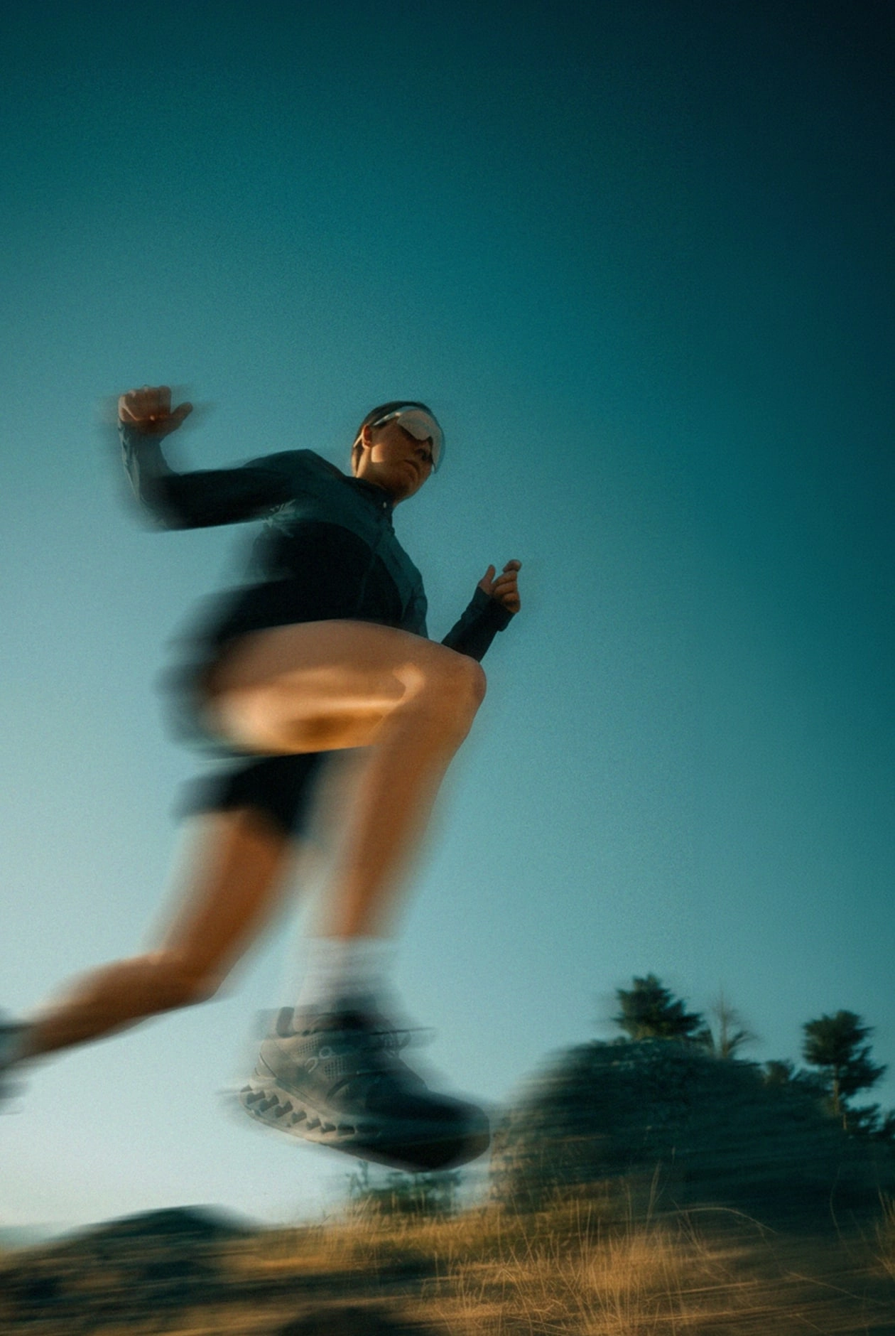 A runner in motion on a trail